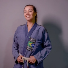 woman wearing jiu jitsu outfit